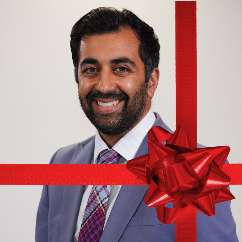 Humza Yousaf's official portrait with a Christmas bow added on top as his governemnt delivers the Scottish Budget.